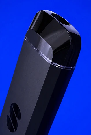 The faceted top of a black Briq, seen from above