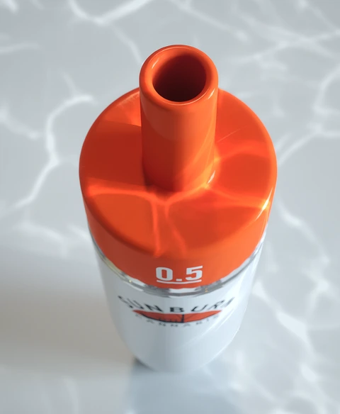 The orange mouthpiece of a Buoy device, seen from above