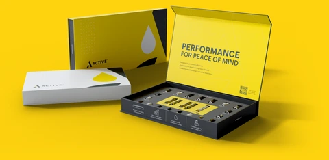 An ACTIVE sample box, open, with cartridges and batteries inside